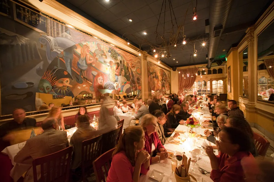 The warmly lit Sotto Sopra dining room